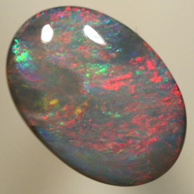 SOLID BLACK OPAL Strong burning red over green